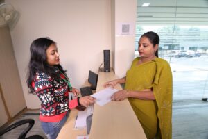 women checks in for diabetic eye exam